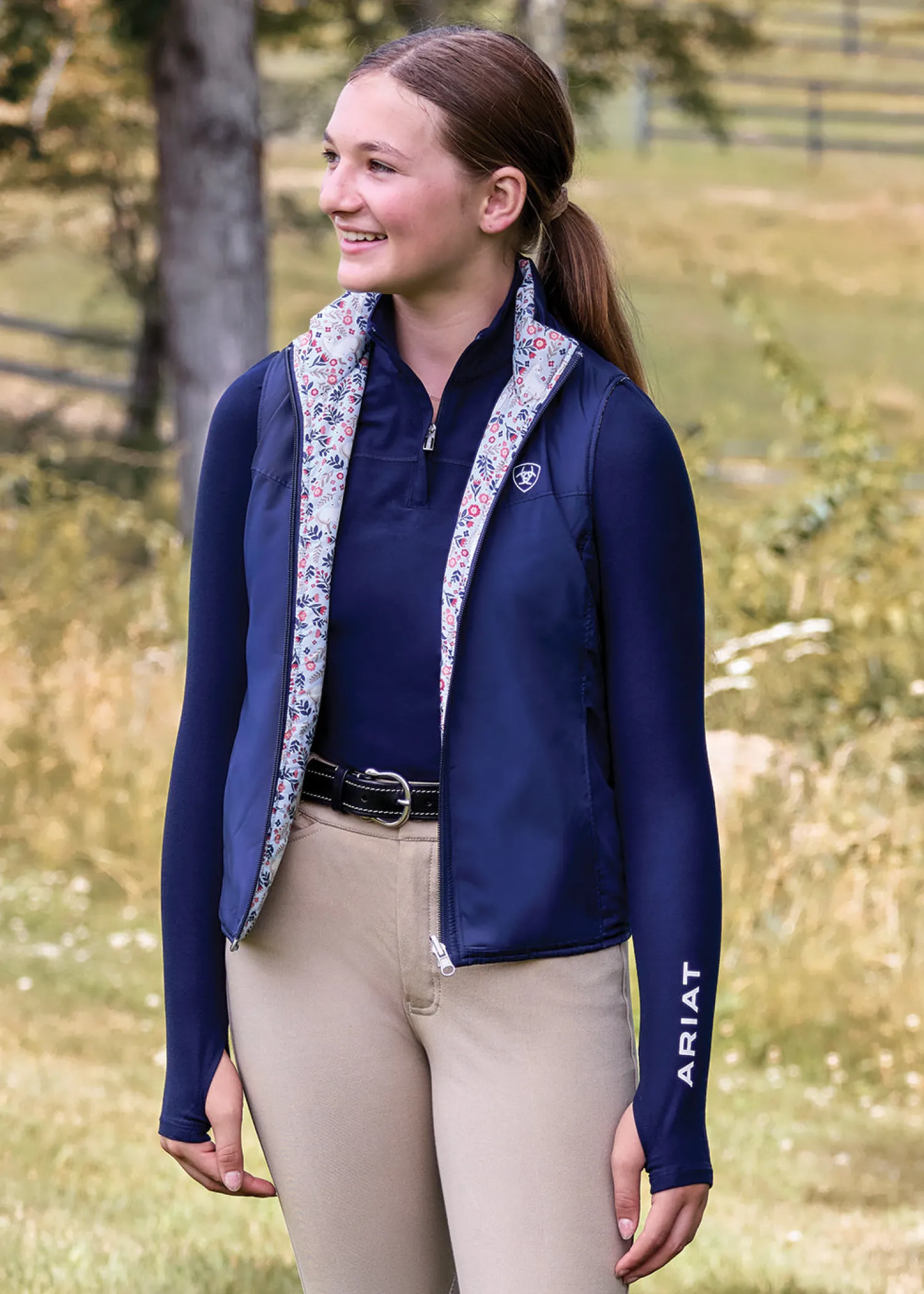 ARIAT-APPAREL Ariat® Kids’ Bella Reversible Vest Posey Pony Print Hot