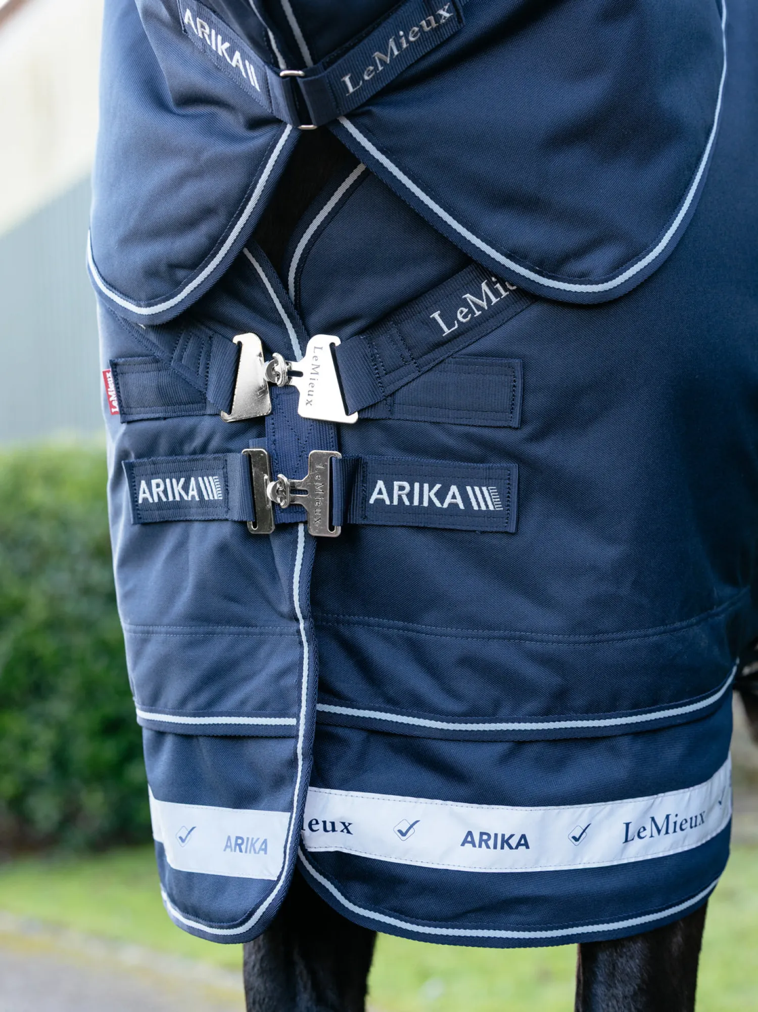 HORSE HEALTH TRADE LeMieux® Arika Storm-Tek 100 Gram Turnout Blanket with Leg Straps Navy/White/Navy Clearance